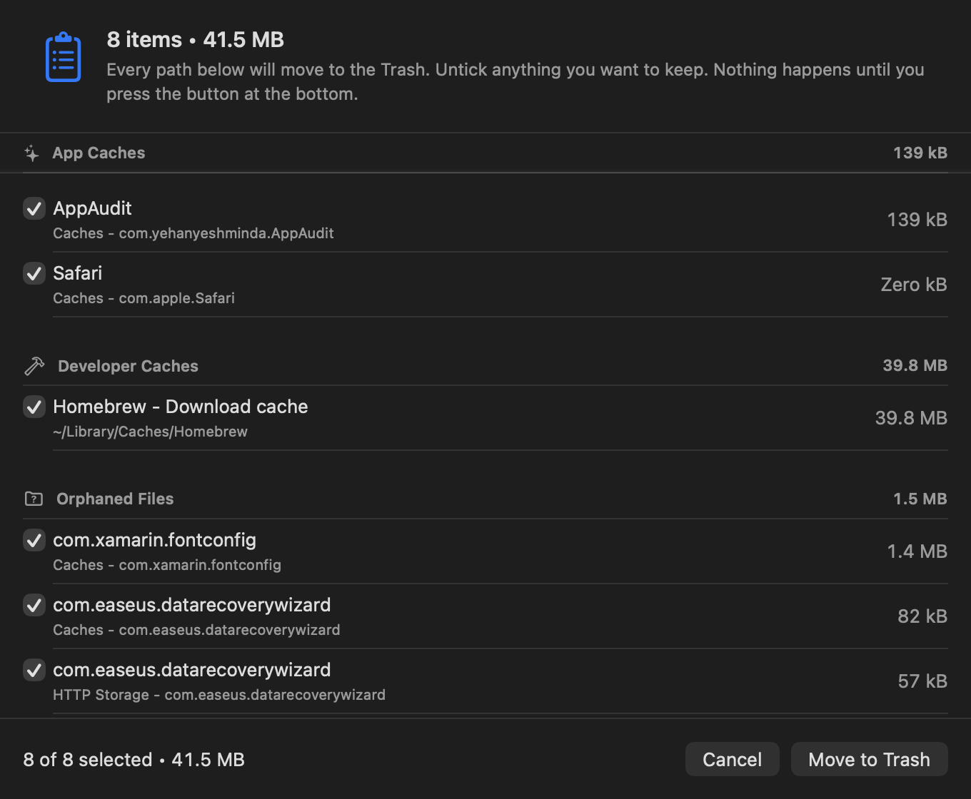 The review sheet: eight items grouped by category, each with a checkbox, and a Move to Trash button